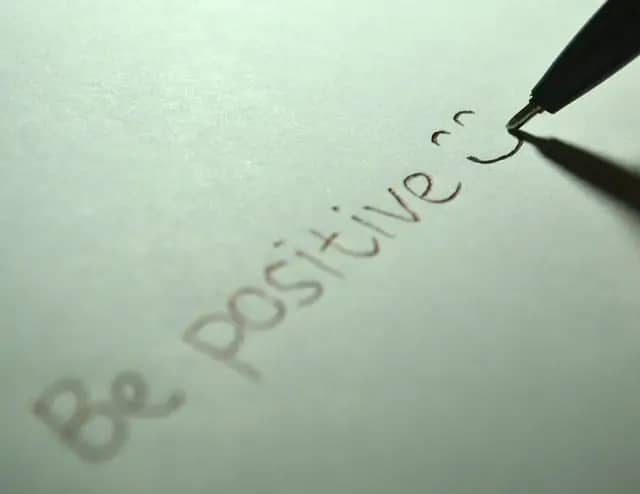 Note that says "be positive" 50 abundance affirmations